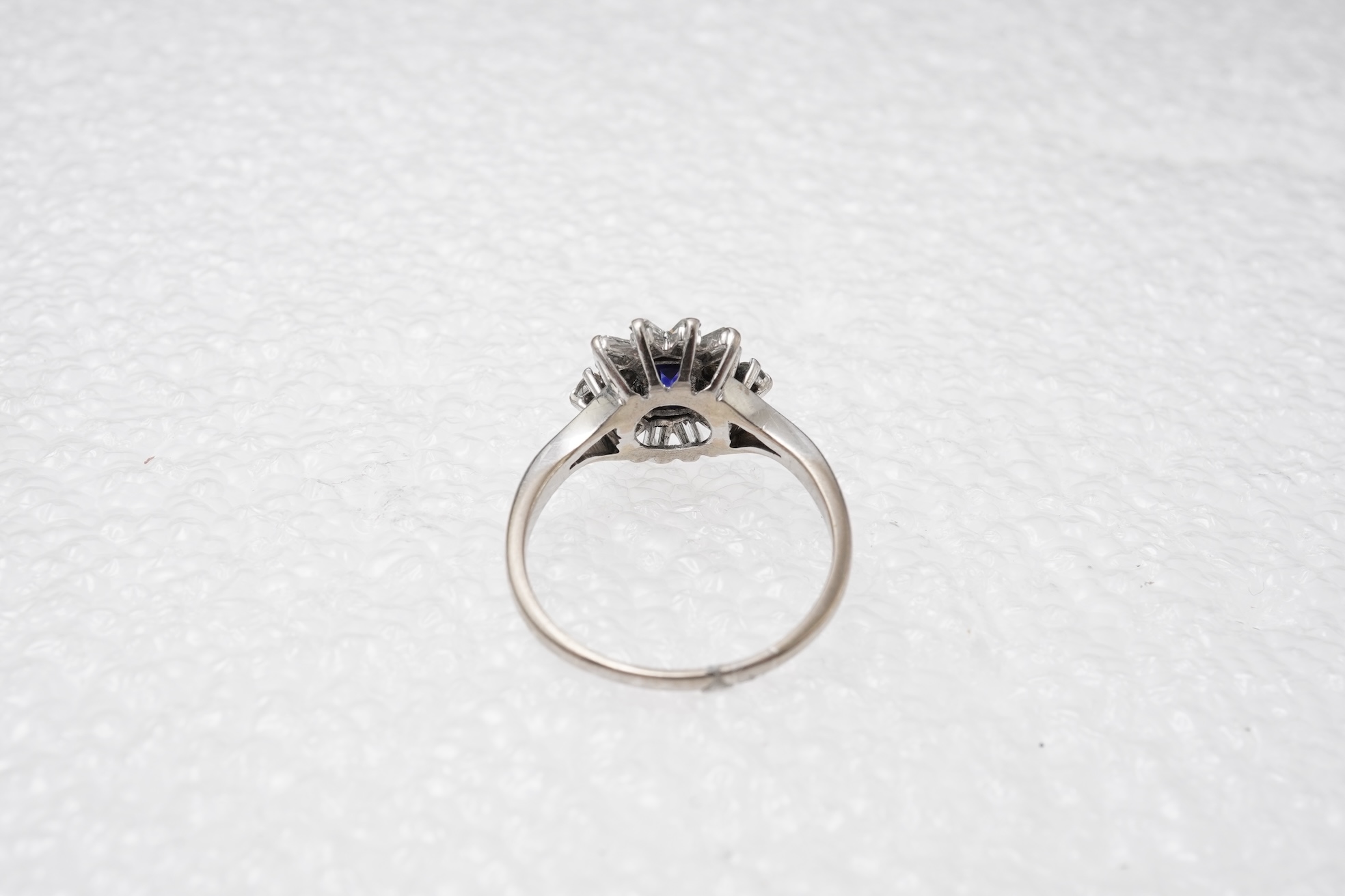 A sapphire and diamond ring, mid 20th century